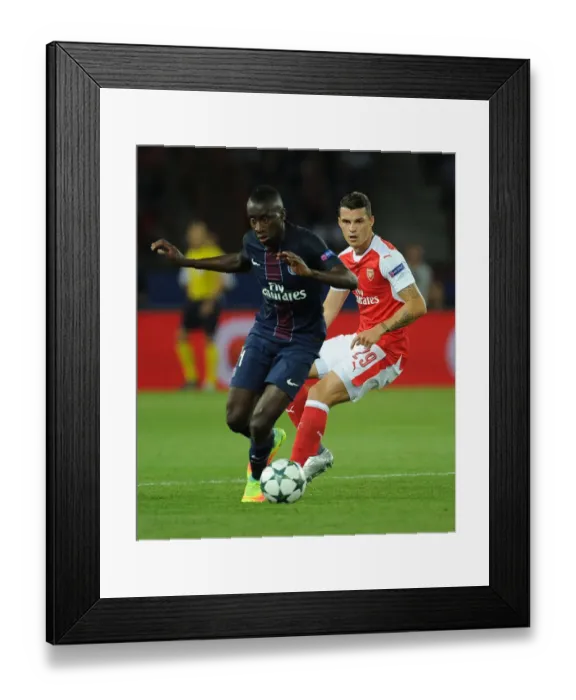 Framed Print : Champions League Showdown: Xhaka vs. Matuidi - Paris Saint-Germain vs. Arsenal (2016-17): A Battle of Midfield Titans