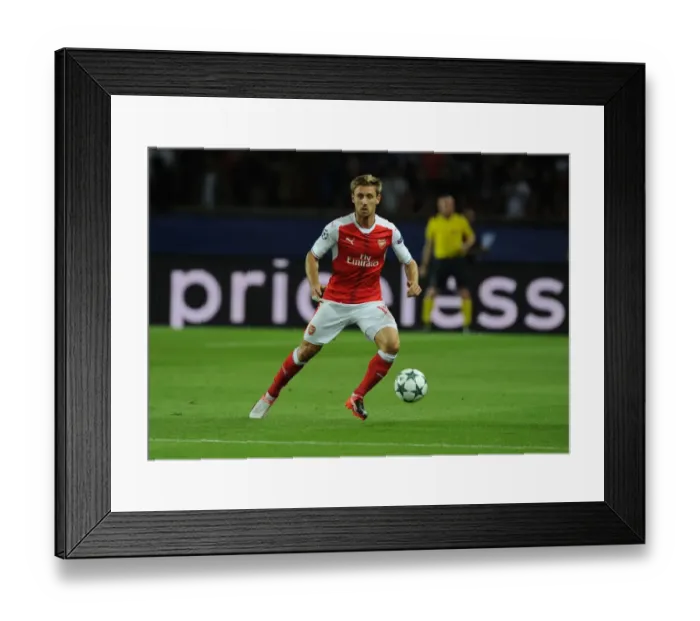 Framed Print : Champions League Showdown: Monreal's Battle at Parc des Princes - Paris Saint-Germain vs. Arsenal