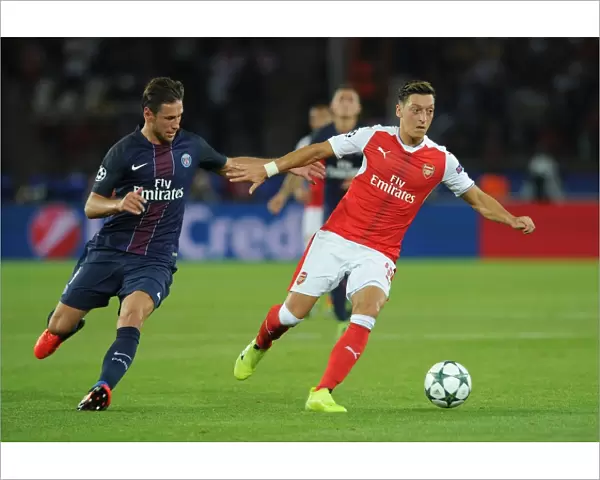 Mesut Ozil vs. Grzegorz Krychowiak: A Champions League Battle at Parc des Princes, 2016