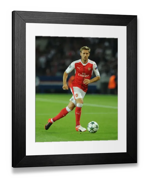 Framed Print : Champions League Showdown: Monreal's Battle at Parc des Princes - Paris Saint-Germain vs. Arsenal