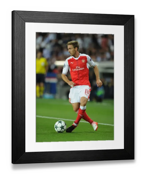 Framed Print : Champions League Showdown: Monreal's Determination - Paris Saint-Germain vs. Arsenal