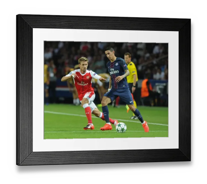 Framed Print : Nacho Monreal Shuts Down Angel Di Maria: Paris Saint-Germain vs. Arsenal, UEFA Champions League 2016-17