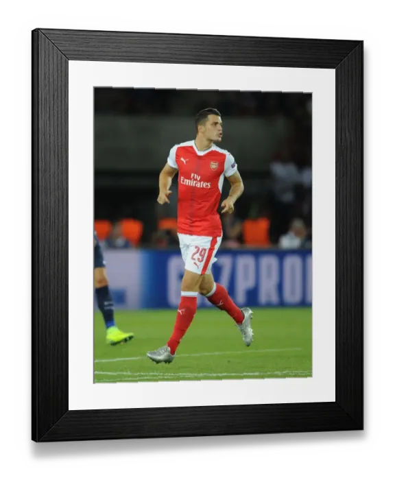 Framed Print : Granit Xhaka: Arsenal Star in Action against Paris Saint-Germain, UEFA Champions League 2016-17