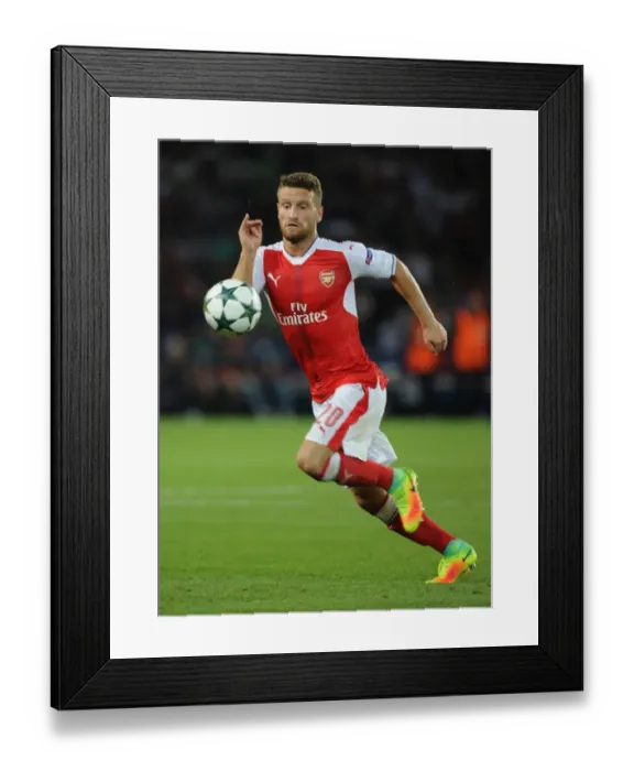 Framed Print : Mustafi in Action: Arsenal vs. Paris Saint-Germain, UEFA Champions League 2016-17
