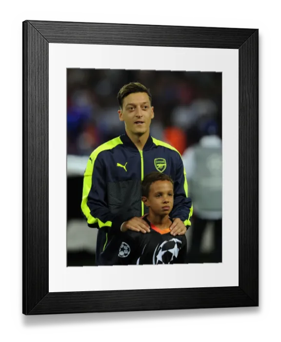 Framed Print : Mesut Ozil: Arsenal's Star Gears Up for Paris Saint-Germain Showdown in 2016-17 Champions League