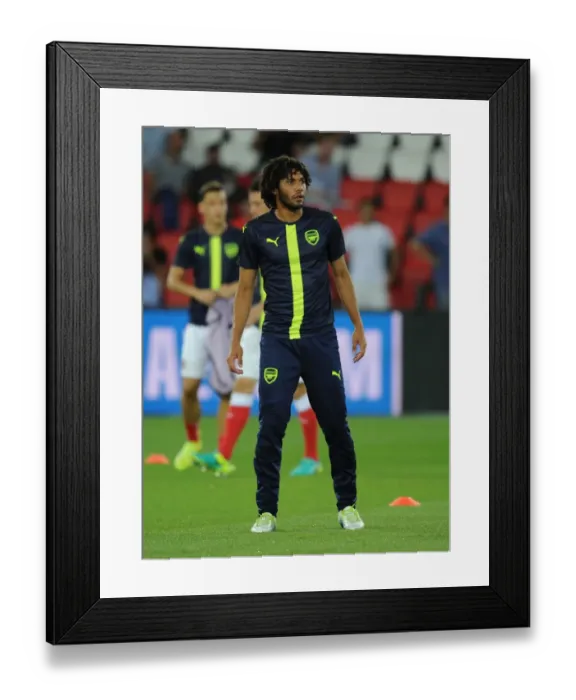 Framed Print : Mohamed Elneny Gears Up for Paris Saint-Germain vs Arsenal UCL Showdown, 2016