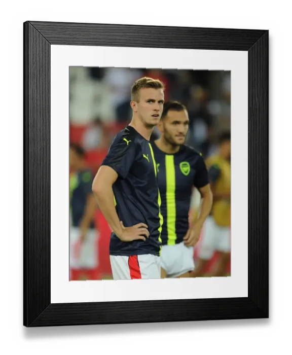 Framed Print : Rob Holding's Steely Gaze: Arsenal's Defender Prepares for Paris Saint-Germain Champions League Showdown Framed Print : Rob Holding's Steely Gaze: Arsenal's Defender Prepares for Paris Saint-Germain Champions League Showdown