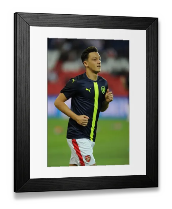 Framed Print : Mesut Ozil Gears Up for Arsenal vs. Paris Saint-Germain Champions League Clash (2016-17) Framed Print : Mesut Ozil Gears Up for Arsenal vs. Paris Saint-Germain Champions League Clash (2016-17)