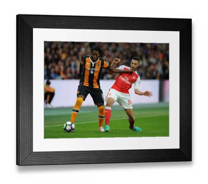 Framed Print : Coquelin vs Mbokani: A Premier League Showdown at Hull City