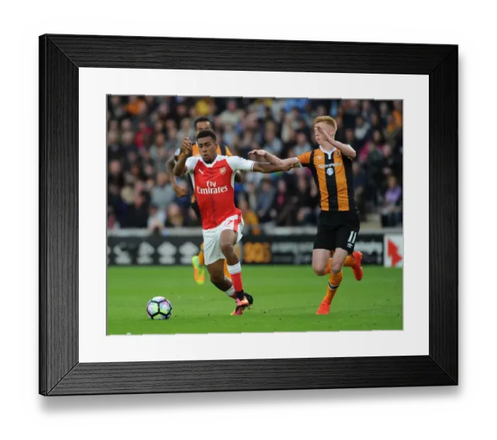 Framed Print : Arsenal's Alex Iwobi vs. Hull's Sam Clucas: A Premier League Battle at KCOM Stadium Framed Print : Arsenal's Alex Iwobi vs. Hull's Sam Clucas: A Premier League Battle at KCOM Stadium
