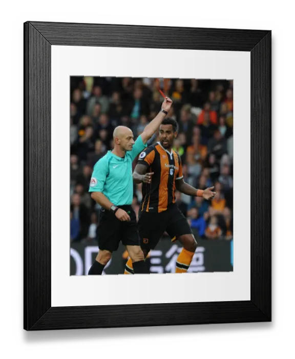 Framed Print : Red Card Drama: Huddlestone Dismissed as Arsenal Secure Premier League Victory Over Hull