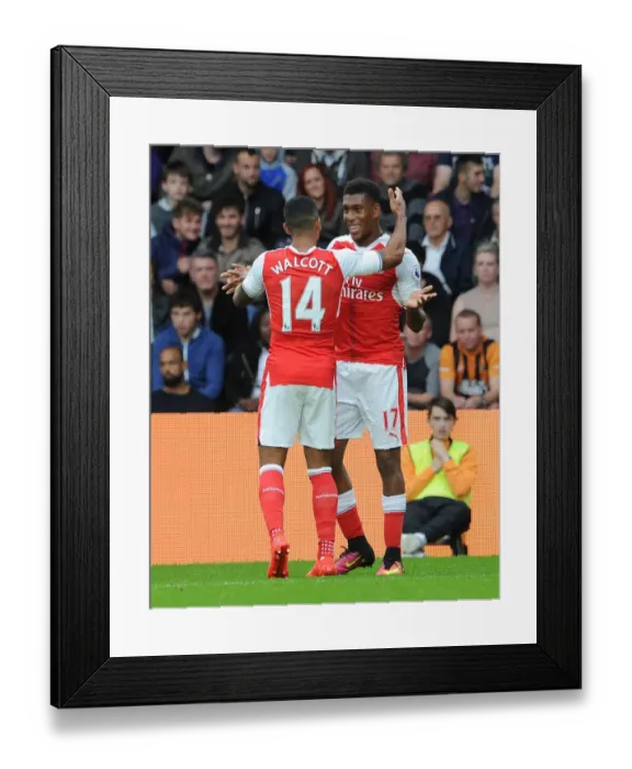 Framed Print : Celebrating Their First: Iwobi and Walcott's Thrilling Goal Moment at Hull City vs Arsenal (2016-17) Framed Print : Celebrating Their First: Iwobi and Walcott's Thrilling Goal Moment at Hull City vs Arsenal (2016-17)