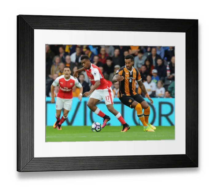 Framed Print : Arsenal's Iwobi and Huddlestone Clash in Intense Premier League Face-off Framed Print : Arsenal's Iwobi and Huddlestone Clash in Intense Premier League Face-off