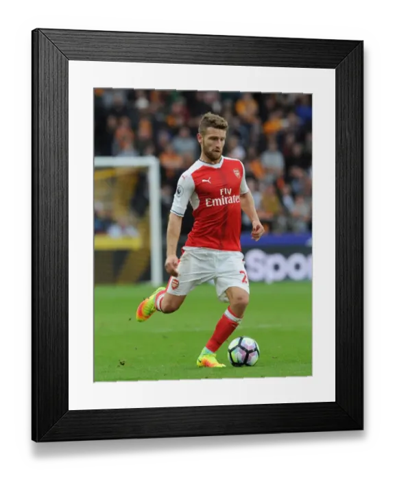 Framed Print : Shkodran Mustafi: Unwavering Concentration in Hull City vs Arsenal (2016-17) Framed Print : Shkodran Mustafi: Unwavering Concentration in Hull City vs Arsenal (2016-17)