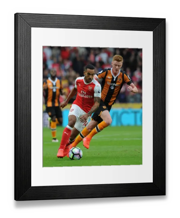 Framed Print : Theo Walcott vs. Sam Clucas: A Premier League Battle at KCOM Stadium Framed Print : Theo Walcott vs. Sam Clucas: A Premier League Battle at KCOM Stadium