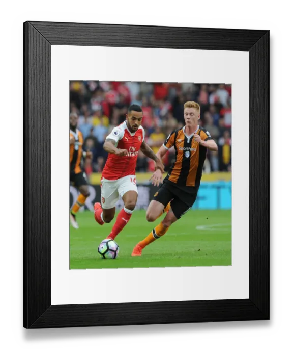 Framed Print : Theo Walcott vs Sam Clucas: A Premier League Showdown at KCOM Stadium Framed Print : Theo Walcott vs Sam Clucas: A Premier League Showdown at KCOM Stadium