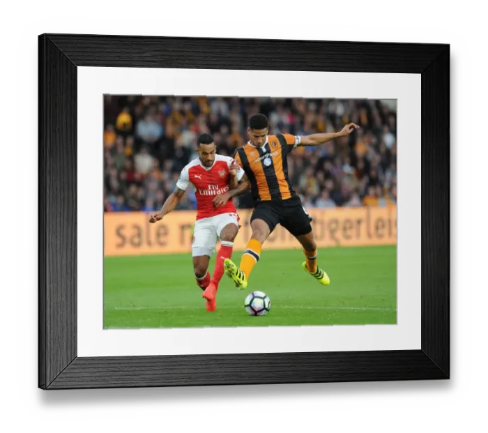 Framed Print : Theo Walcott vs. Curtis Davies: A Footballing Battle in the Hull City vs. Arsenal Premier League Clash (September 2016) Framed Print : Theo Walcott vs. Curtis Davies: A Footballing Battle in the Hull City vs. Arsenal Premier League Clash (September 2016)