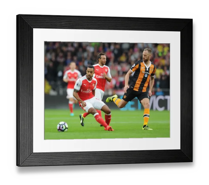 Framed Print : Theo Walcott (Arsenal) David Meyler (Hull). Hull City 1: 4 Arsenal. Premier League Framed Print : Theo Walcott (Arsenal) David Meyler (Hull). Hull City 1: 4 Arsenal. Premier League