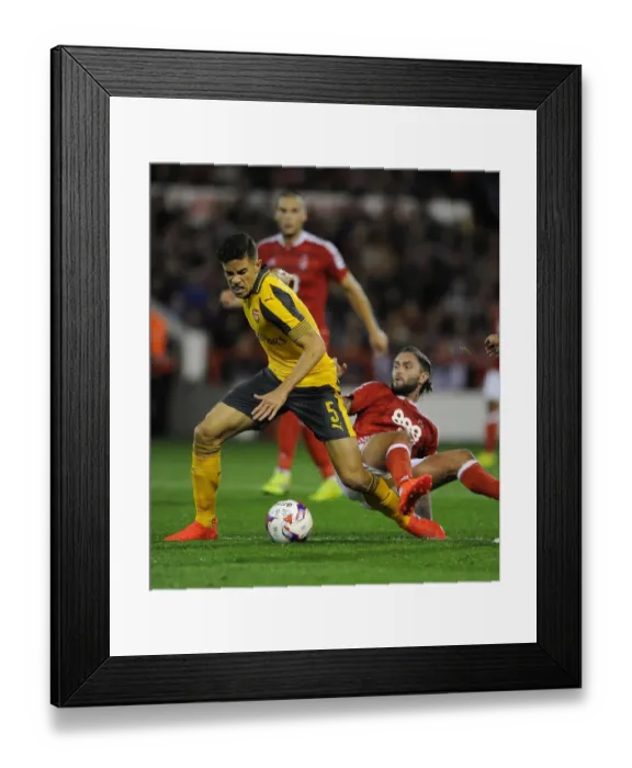 Framed Print : Gabriel vs Lansbury: A Battle in the EFL Cup Third Round - Nottingham Forest vs Arsenal Framed Print : Gabriel vs Lansbury: A Battle in the EFL Cup Third Round - Nottingham Forest vs Arsenal
