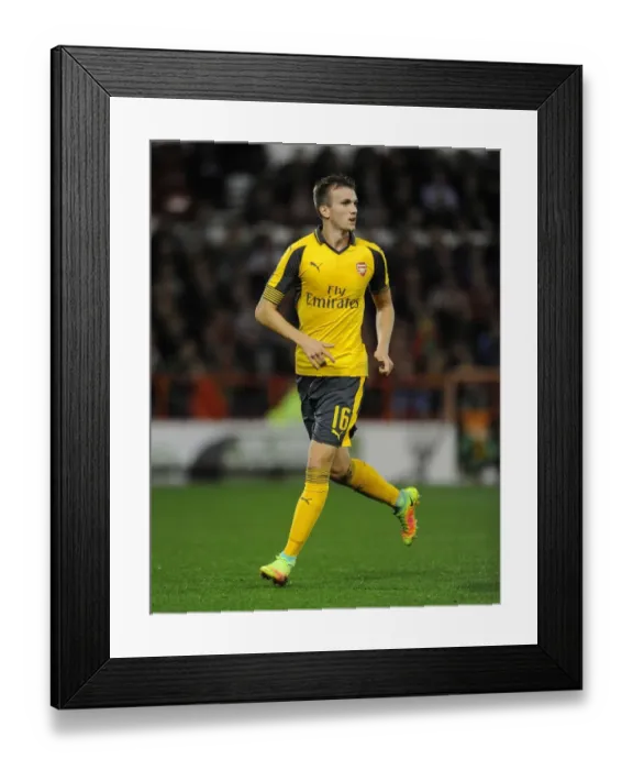 Framed Print : Rob Holding in Action: Arsenal's Victory over Nottingham Forest in the EFL Cup, 2016 Framed Print : Rob Holding in Action: Arsenal's Victory over Nottingham Forest in the EFL Cup, 2016