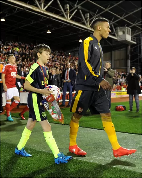 The Arsenal mascot walks out with Kieran Gibbs (Arsenal). Nottingham Forest 0: 4 Arsenal