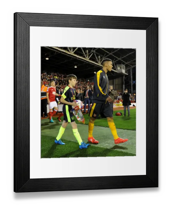 Framed Print : The Arsenal mascot walks out with Kieran Gibbs (Arsenal). Nottingham Forest 0: 4 Arsenal Framed Print : The Arsenal mascot walks out with Kieran Gibbs (Arsenal). Nottingham Forest 0: 4 Arsenal