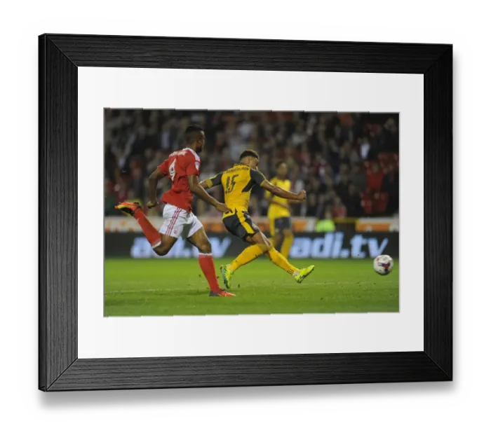 Framed Print : Alex Oxlade-Chamberlain's Brace: Arsenal Dominate Nottingham Forest in EFL Cup Third Round