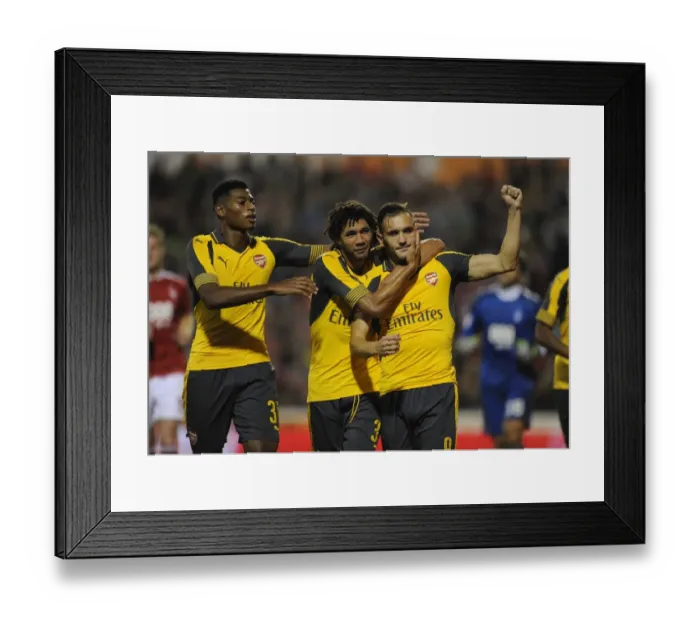 Framed Print : Arsenal's Perez, Reine-Adelaide, and Elneny Celebrate Goals Against Nottingham Forest in EFL Cup Framed Print : Arsenal's Perez, Reine-Adelaide, and Elneny Celebrate Goals Against Nottingham Forest in EFL Cup
