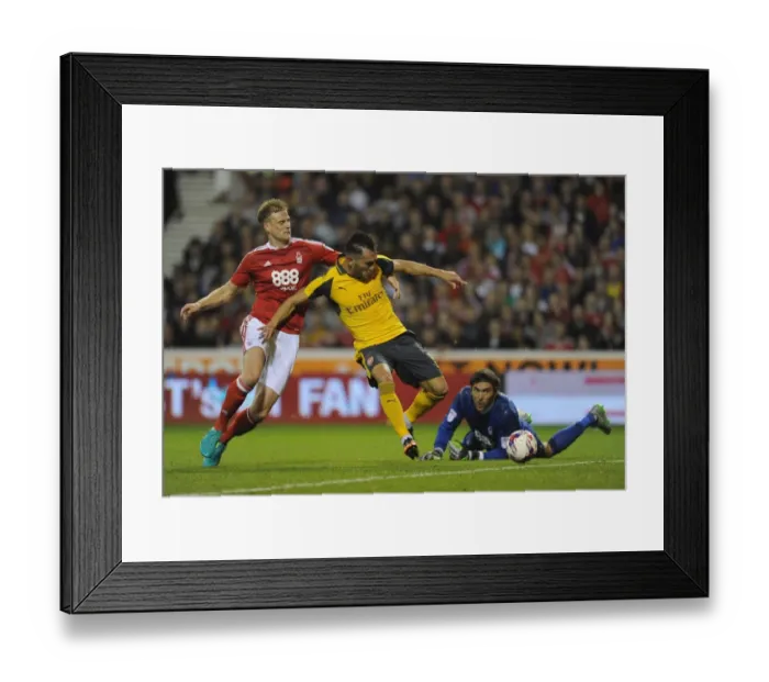 Framed Print : Lucas Perez's Dramatic Goal: Arsenal Overpowers Nottingham Forest in EFL Cup
