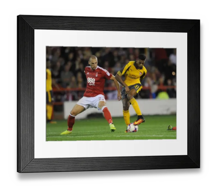 Framed Print : Clash of Midfielders: Reine-Adelaide vs. Kasami - Nottingham Forest vs. Arsenal EFL Cup Third Round