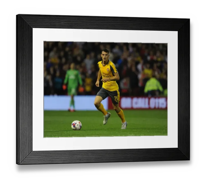 Framed Print : Granit Xhaka in Action: Arsenal's Midfield Maestro Shines Against Nottingham Forest in EFL Cup (2016-17) Framed Print : Granit Xhaka in Action: Arsenal's Midfield Maestro Shines Against Nottingham Forest in EFL Cup (2016-17)