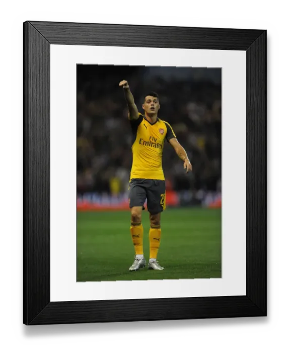 Framed Print : Granit Xhaka: Arsenal's Midfield Maestro Dazzles in EFL Cup Victory over Nottingham Forest
