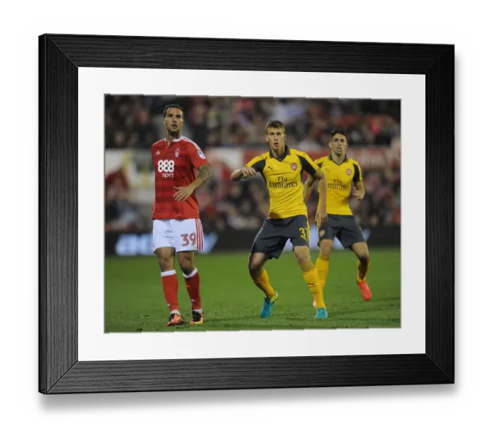 Framed Print : Krystian Bielik (Arsenal) Apostolos Vellios (Forest). Nottingham Forest 0: 4 Arsenal Framed Print : Krystian Bielik (Arsenal) Apostolos Vellios (Forest). Nottingham Forest 0: 4 Arsenal