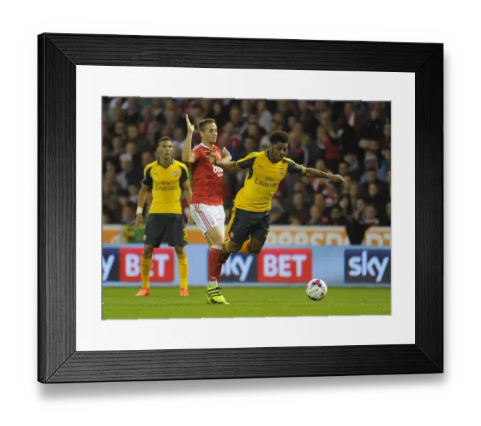 Framed Print : Chuba Akpom (Arsenal) Chris Cohen (Forest). Nottingham Forest 0: 4 Arsenal. EPL League Cup Framed Print : Chuba Akpom (Arsenal) Chris Cohen (Forest). Nottingham Forest 0: 4 Arsenal. EPL League Cup