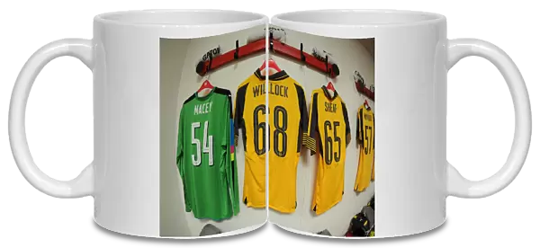 Matt Macey, Chris Willock and Ben Sheaf (Arsenal) shirts in the changingroom