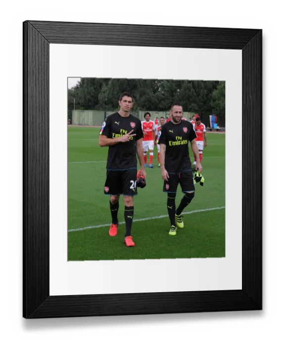 Framed Print : Arsenal Goalkeepers: Emiliano Martinez and David Ospina at 2016-17 First Team Squad Photocall