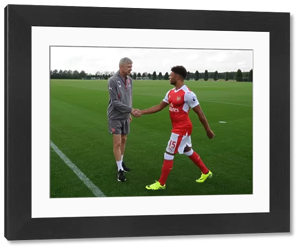 Arsene Wenger Arsenal Manager and Alex Oxlade-Chamberlain (Arsenal)