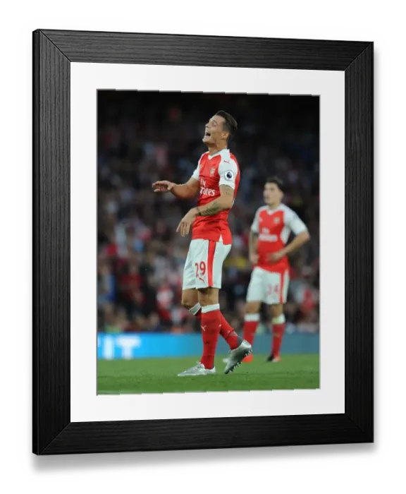 Framed Print : Granit Xhaka in Action: Arsenal vs Chelsea, Premier League 2016-17 Framed Print : Granit Xhaka in Action: Arsenal vs Chelsea, Premier League 2016-17
