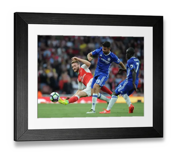 Framed Print : Mustafi Stops Costa: Intense Tackle in Arsenal vs. Chelsea Premier League Clash, 2016-17