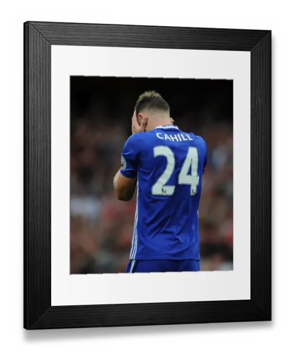 Framed Print : Arsenal Capitalize: Chelsea's Error Costly in Arsenal v Chelsea, Premier League 2016-17
