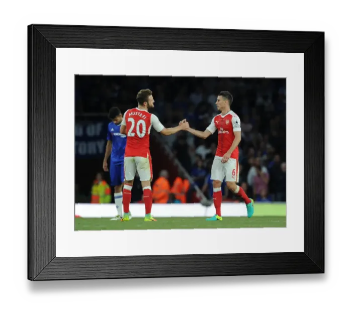 Framed Print : Arsenal's Mustafi and Koscielny in Action: Arsenal vs. Chelsea (2016-17)