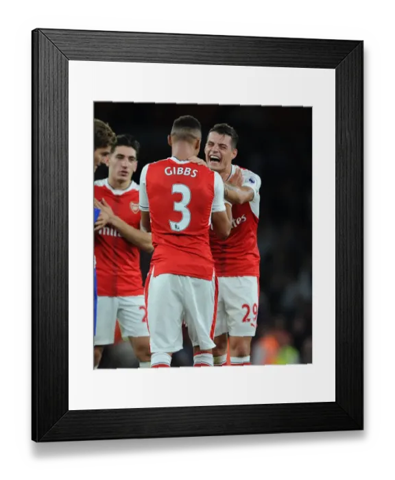 Framed Print : Arsenal's Xhaka and Gibbs: A Moment of Relief after Arsenal vs. Chelsea (2016-17) Framed Print : Arsenal's Xhaka and Gibbs: A Moment of Relief after Arsenal vs. Chelsea (2016-17)