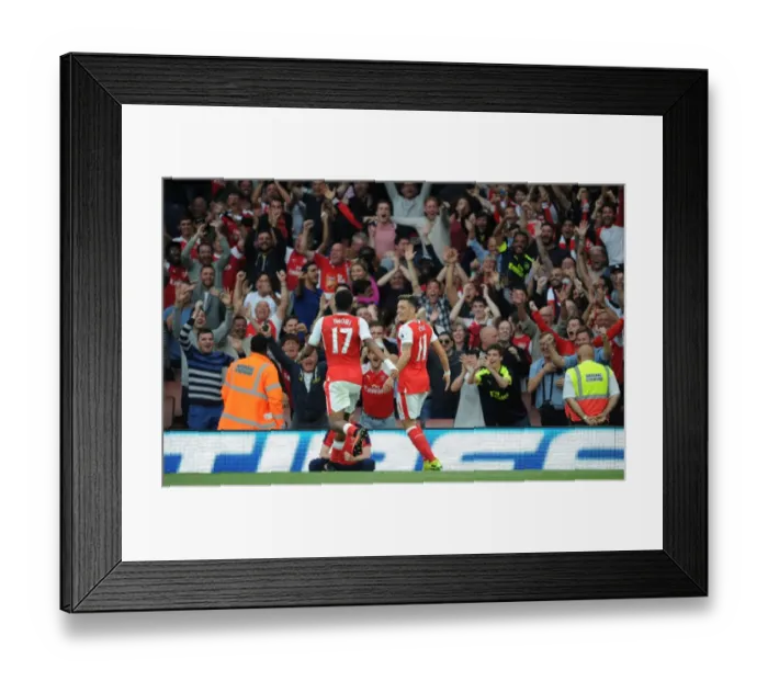 Framed Print : Arsenal Triumph: Mesut Ozil and Alex Iwobi's Goal Celebration vs. Chelsea (2016-17)