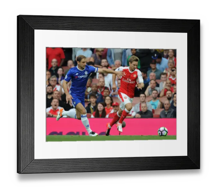 Framed Print : Monreal vs. Ivanovic: A Premier League Battle at Emirates Stadium Framed Print : Monreal vs. Ivanovic: A Premier League Battle at Emirates Stadium