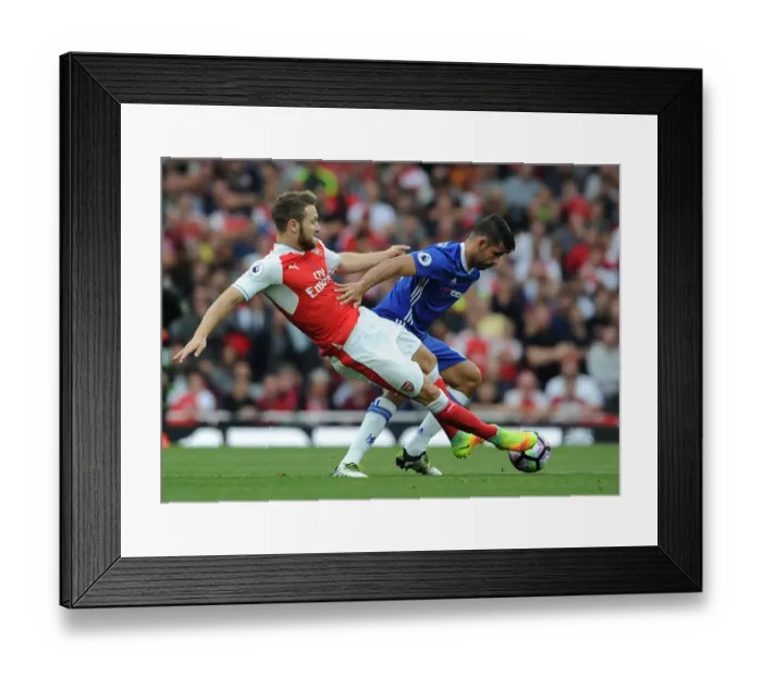 Framed Print : Mustafi vs. Costa: A Premier League Showdown at Arsenal vs. Chelsea