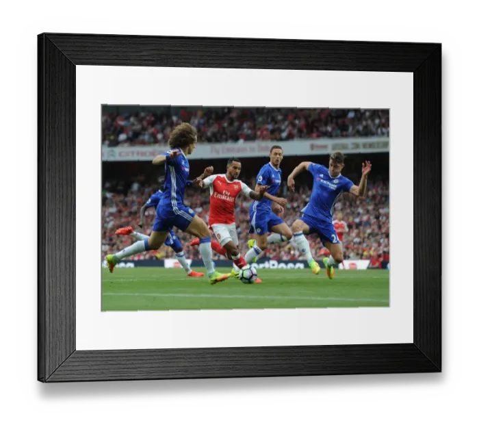 Framed Print : Arsenal vs. Chelsea Showdown: Walcott vs. Luiz and Cahill - A Battle at Emirates