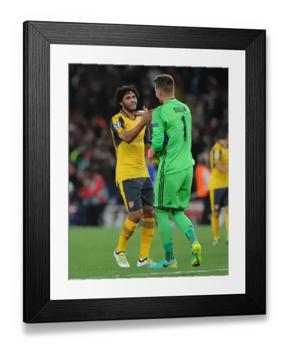 Framed Print : Elneny and Vaclik: A Moment of Sports Camaraderie after Arsenal-Basel UEFA Champions League Clash