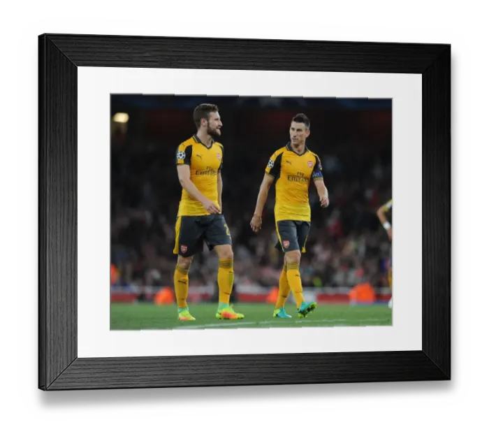 Framed Print : Arsenal's Mustafi and Koscielny in Action: Arsenal vs FC Basel, UEFA Champions League, 2016 Framed Print : Arsenal's Mustafi and Koscielny in Action: Arsenal vs FC Basel, UEFA Champions League, 2016