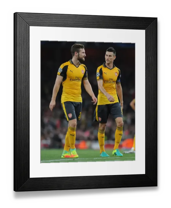 Framed Print : Arsenal's Mustafi and Koscielny in Action: Arsenal v FC Basel (2016-17) Framed Print : Arsenal's Mustafi and Koscielny in Action: Arsenal v FC Basel (2016-17)