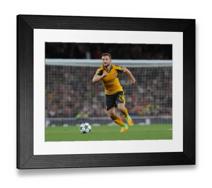 Framed Print : Shkodran Mustafi in Action: Arsenal vs FC Basel, UEFA Champions League, 2016